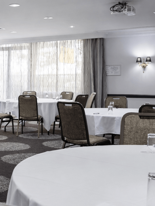 A logo for View Hotels featuring stylized text with a blue and white color scheme and abstract circular design elements.