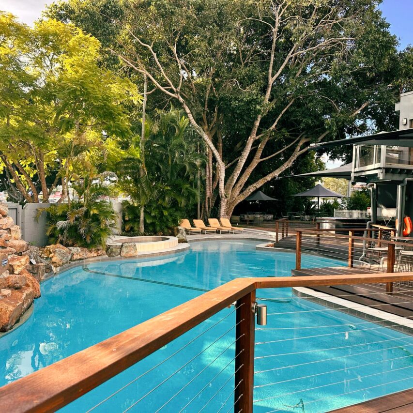 Sunny shot of pool and balcony area.