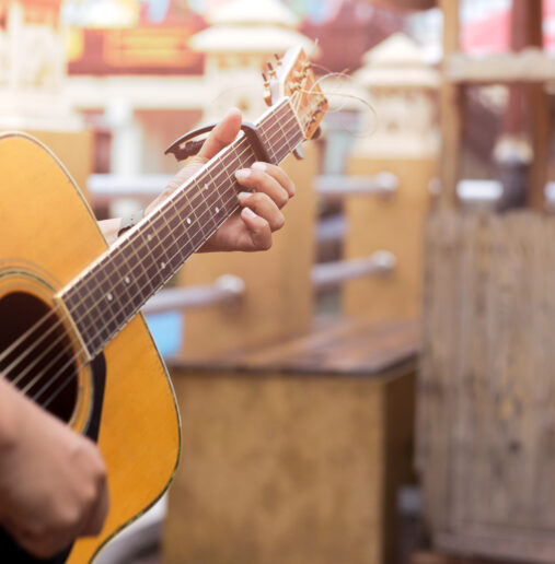Man playing acoustic guitar
