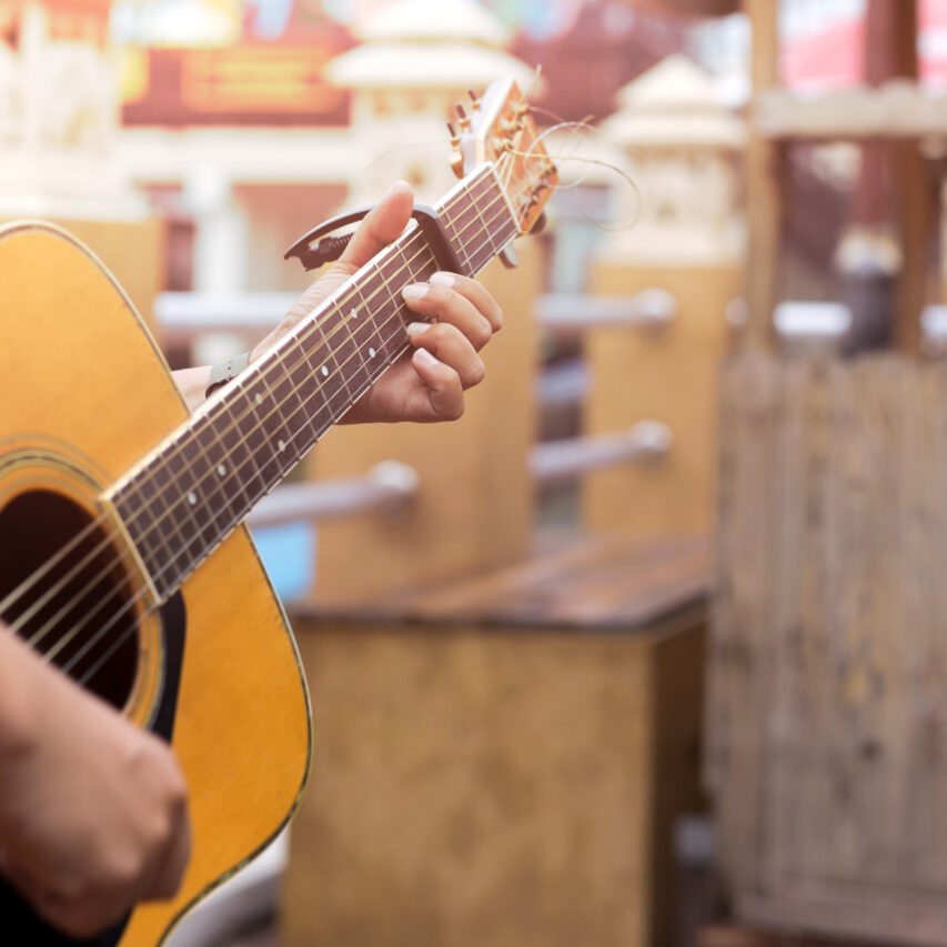 Man playing acoustic guitar