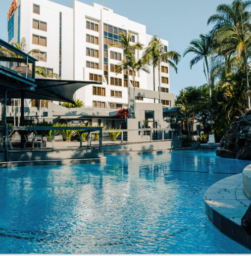 View Brisbane outdoor area swimming pool palm trees and summer