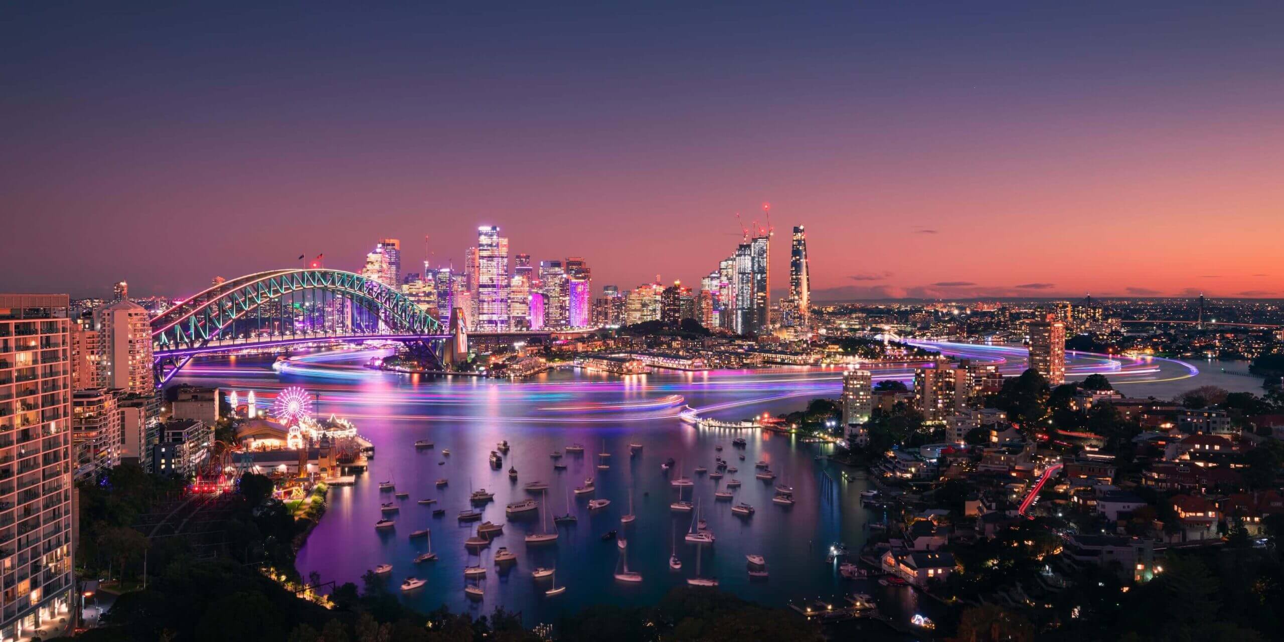 Views of the Sydney Harbour Bridge and Sydney Harbour during Vivid Sydney 2023, from the View Hotel in North Sydney.